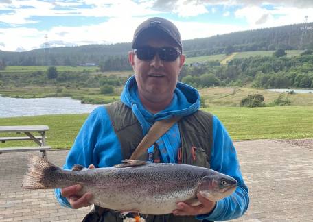Paul Mallaburn with a nice 4lb 8oz Rainbow caught from Coe Crag lake 