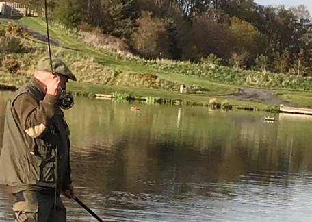 Brian Bailes playing a fish on Scarecrow Point