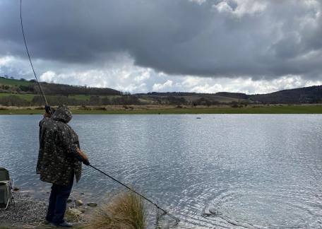 Colin Smith netting one of his 8 fish on Thursday