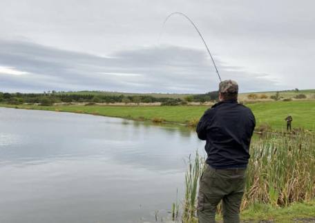 Max Gott playing a hard fighting Rainbow, caught using a Bloodworm Pattern