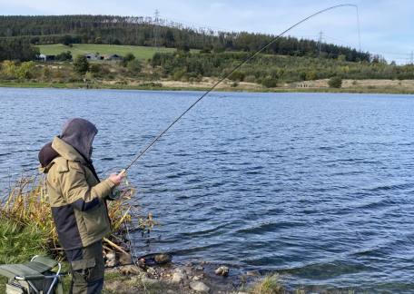Ray Wilson playing one of his six fish on Long Crag 