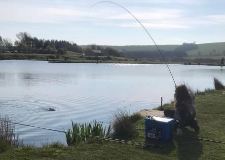 Linda Straughan netting a fish during the morning session
