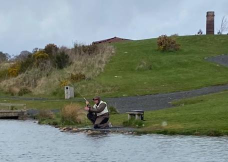 Rob Hall playing a fish on Long Crag Lake 