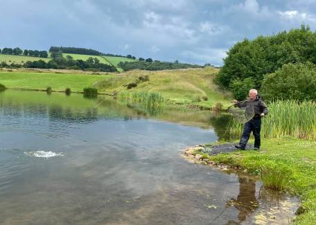 Matty Devine playing one of his 16 fish