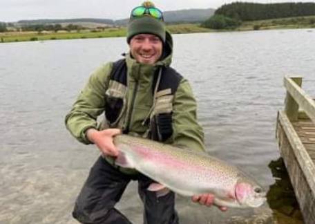 Jed Armstrong pictured with a 15lb Rainbow caught on Long Crag Lake 