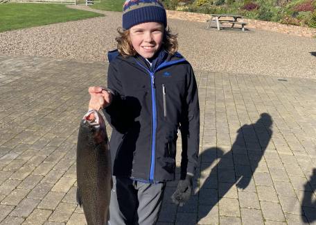 Brodie with his first ever fish caught during a lesson with Bob Smith, caught using a floating line and a GRHE, and weighing an impressive 5lb 1oz.