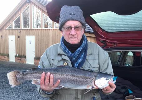 Bob Stewart caught this 7lb Rainbow from Coe Crag Lake using a Yellow Dancer