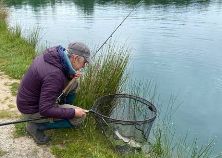 Deb with a nice Rainbow caught during a lesson