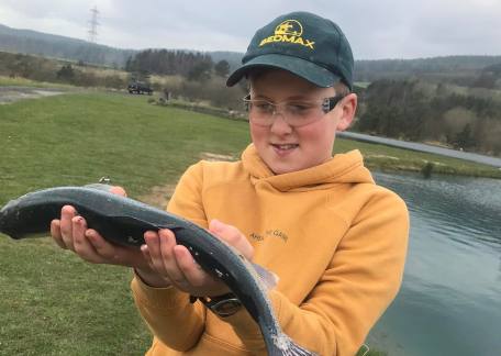 Nice Blue trout for Alex on his second fly fishing lesson