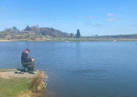 Eric Caisley playing a fish on Scarecrow Point 