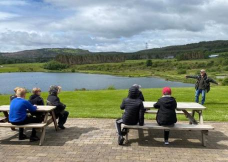 Level 2 coach, Steve McCann giving a fly casting demo to a local school group