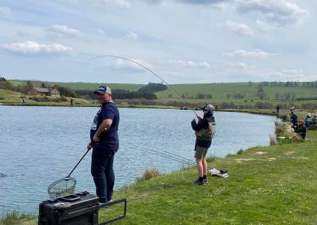 Jack Blakey netting fish number 7 during the PM session