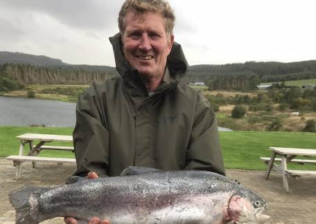 Steve Bailey pictured with a cracking 10lb Rainbow caught using a white egg